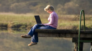 woman on computer visiting community online